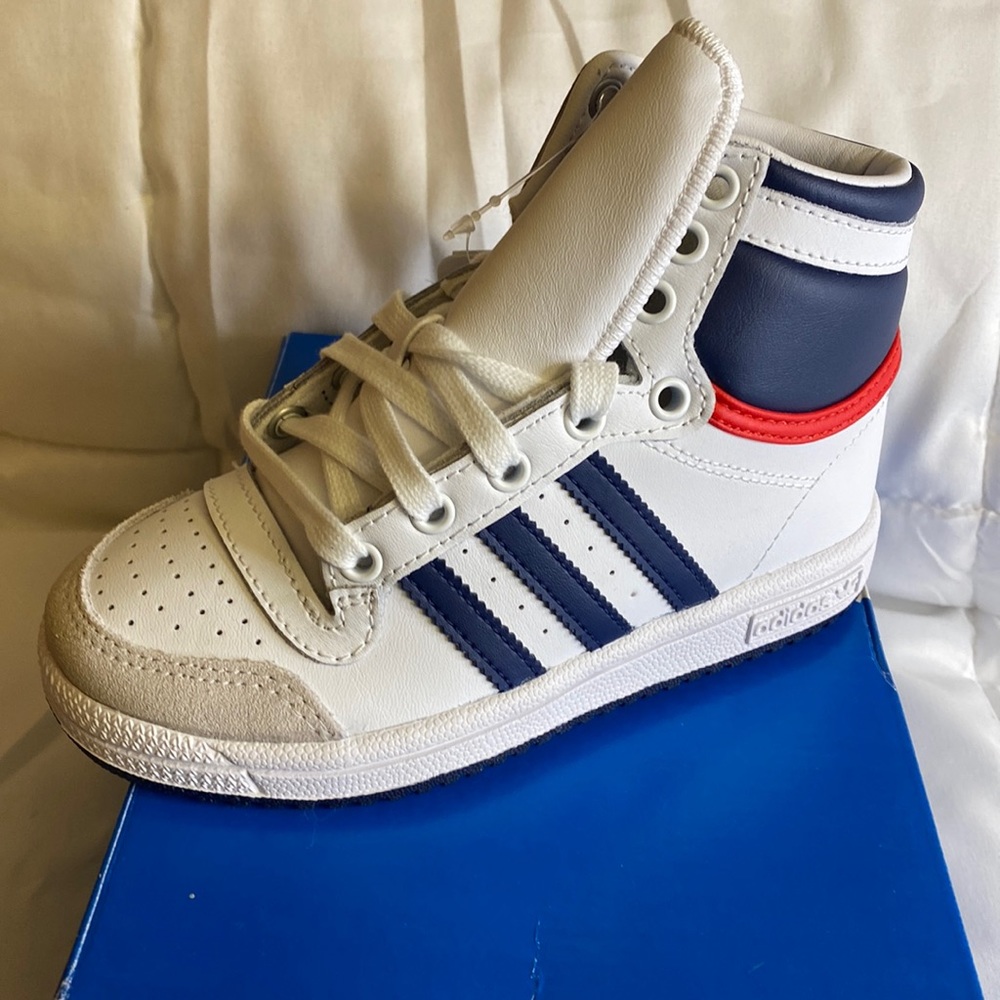 Boys white high top Adidas, w/ blue stripes and blue and red accents on back